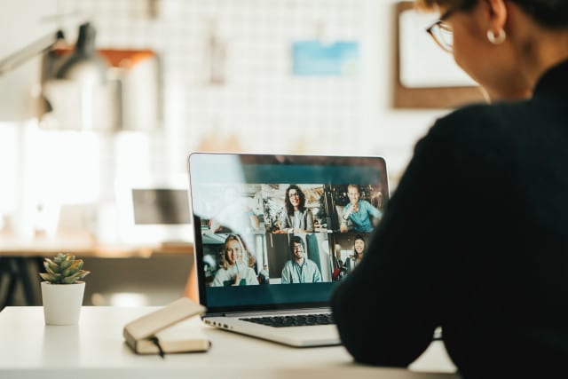 woman at desk on video call